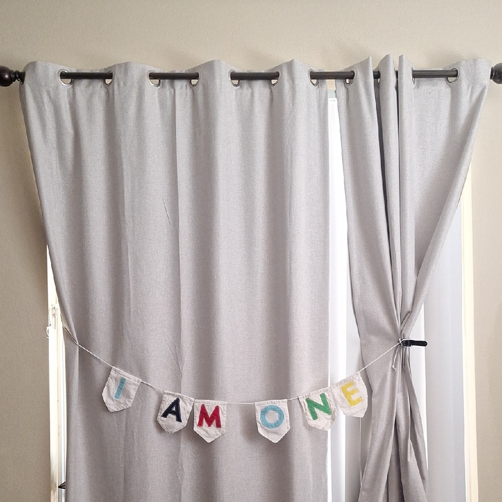 Gray Curtains with Colorful Banner